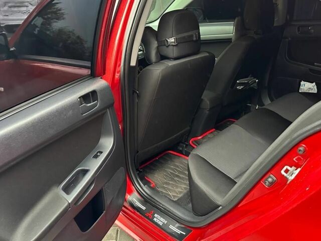 Червоний Міцубісі Lancer, об'ємом двигуна 2 л та пробігом 137 тис. км за 8500 $, фото 8 на Automoto.ua