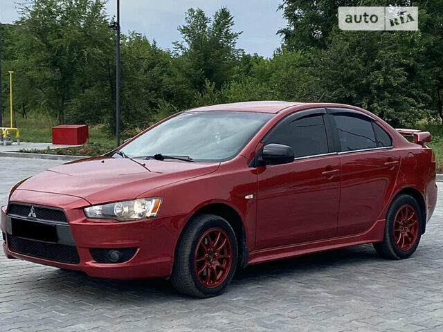 Червоний Міцубісі Lancer, об'ємом двигуна 2 л та пробігом 210 тис. км за 6850 $, фото 4 на Automoto.ua