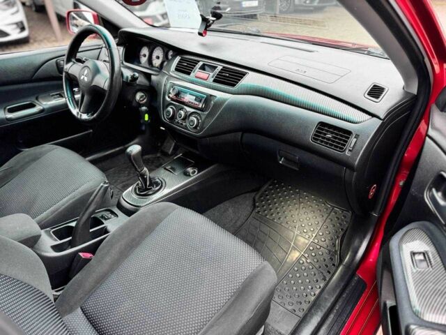 Красный Мицубиси Лансер, объемом двигателя 1.6 л и пробегом 215 тыс. км за 4500 $, фото 15 на Automoto.ua