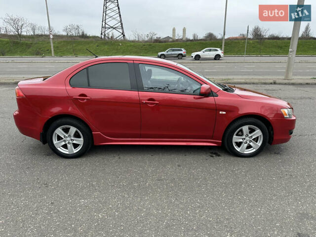 Червоний Міцубісі Lancer, об'ємом двигуна 2 л та пробігом 366 тис. км за 6500 $, фото 13 на Automoto.ua