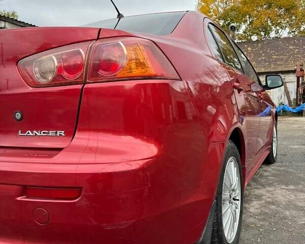 Червоний Міцубісі Lancer, об'ємом двигуна 1.5 л та пробігом 190 тис. км за 6700 $, фото 9 на Automoto.ua