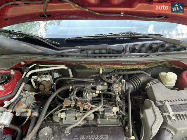 Червоний Міцубісі Lancer, об'ємом двигуна 1.6 л та пробігом 270 тис. км за 5699 $, фото 74 на Automoto.ua