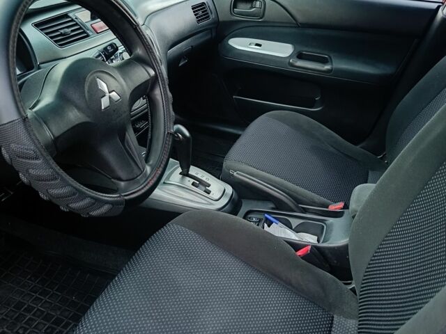 Червоний Міцубісі Lancer, об'ємом двигуна 1.6 л та пробігом 227 тис. км за 5300 $, фото 6 на Automoto.ua