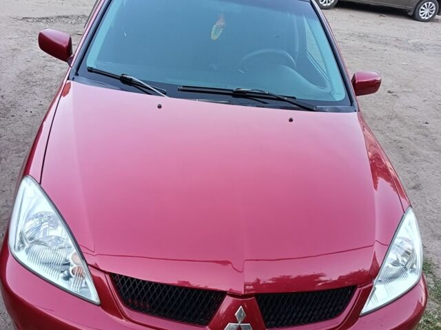 Червоний Міцубісі Lancer, об'ємом двигуна 1.6 л та пробігом 227 тис. км за 5300 $, фото 1 на Automoto.ua