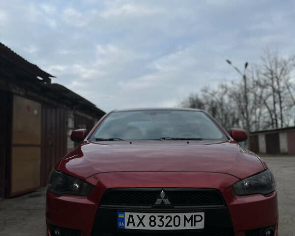 Червоний Міцубісі Lancer, об'ємом двигуна 2 л та пробігом 209 тис. км за 6900 $, фото 3 на Automoto.ua