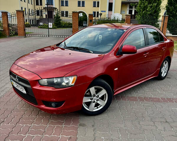 Красный Мицубиси Лансер, объемом двигателя 2 л и пробегом 365 тыс. км за 5000 $, фото 5 на Automoto.ua