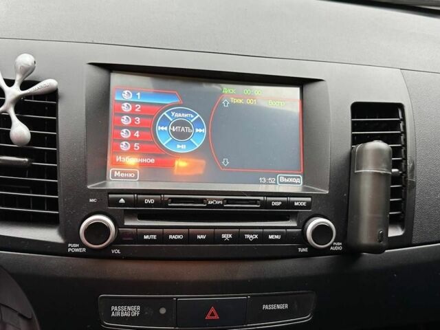 Червоний Міцубісі Lancer, об'ємом двигуна 2 л та пробігом 137 тис. км за 8500 $, фото 13 на Automoto.ua