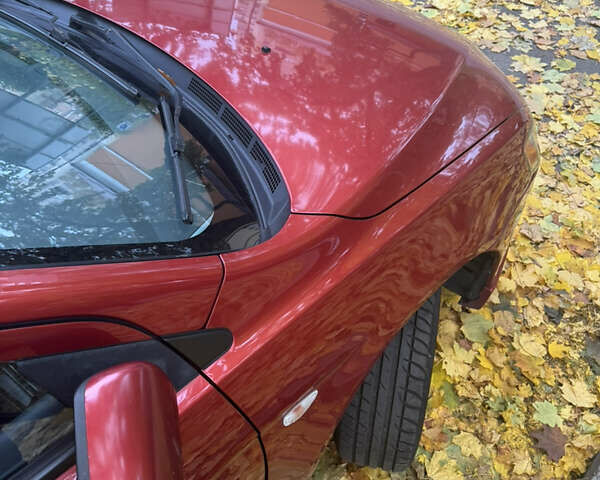 Червоний Міцубісі Lancer, об'ємом двигуна 2 л та пробігом 203 тис. км за 8000 $, фото 11 на Automoto.ua