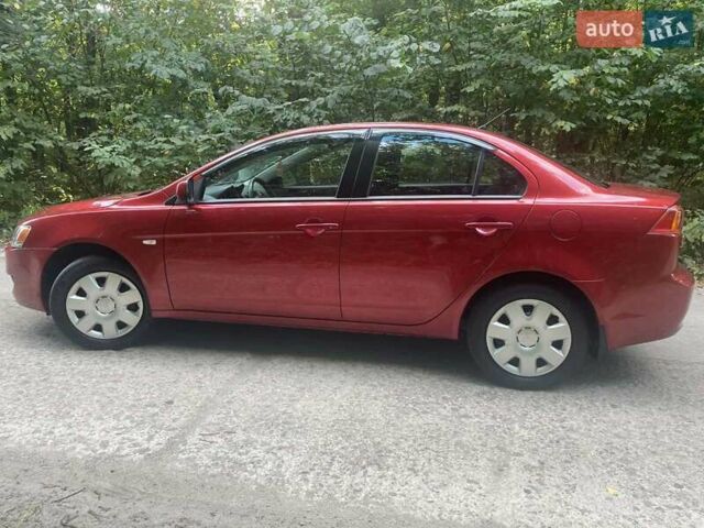 Красный Мицубиси Лансер, объемом двигателя 1.5 л и пробегом 124 тыс. км за 7100 $, фото 9 на Automoto.ua