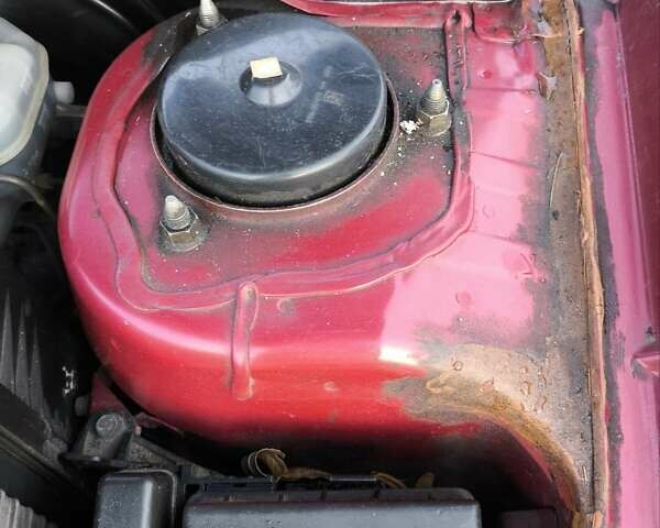 Червоний Міцубісі Lancer, об'ємом двигуна 1.58 л та пробігом 140 тис. км за 6000 $, фото 28 на Automoto.ua