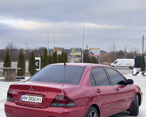 Красный Мицубиси Лансер, объемом двигателя 1.6 л и пробегом 276 тыс. км за 4550 $, фото 5 на Automoto.ua