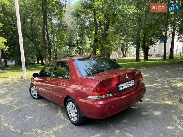 Червоний Міцубісі Lancer, об'ємом двигуна 1.6 л та пробігом 270 тис. км за 5699 $, фото 10 на Automoto.ua