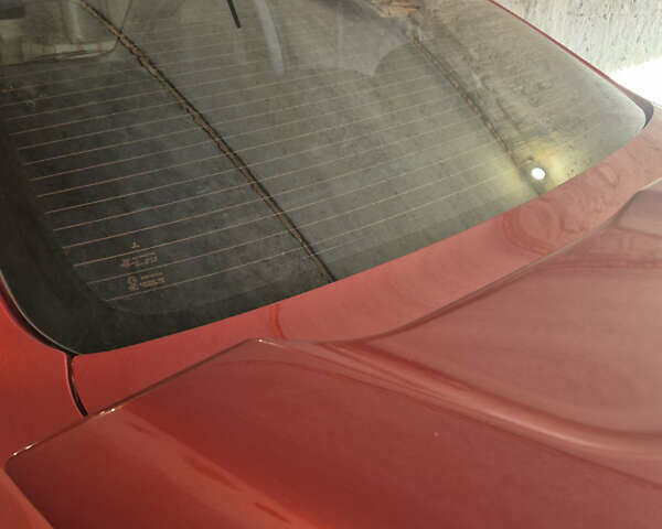 Красный Мицубиси Лансер, объемом двигателя 2 л и пробегом 65 тыс. км за 9300 $, фото 13 на Automoto.ua