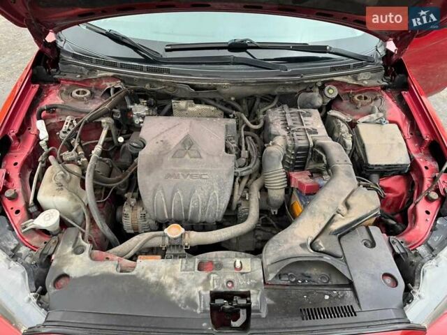 Червоний Міцубісі Lancer, об'ємом двигуна 1.5 л та пробігом 190 тис. км за 6700 $, фото 4 на Automoto.ua