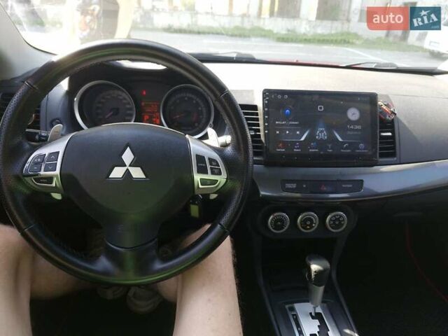 Червоний Міцубісі Lancer, об'ємом двигуна 2 л та пробігом 184 тис. км за 6200 $, фото 11 на Automoto.ua