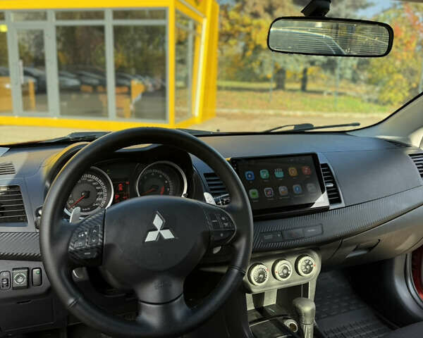 Червоний Міцубісі Lancer, об'ємом двигуна 2 л та пробігом 215 тис. км за 6500 $, фото 13 на Automoto.ua