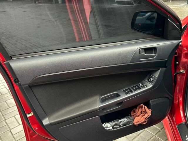 Червоний Міцубісі Lancer, об'ємом двигуна 2 л та пробігом 137 тис. км за 8500 $, фото 9 на Automoto.ua