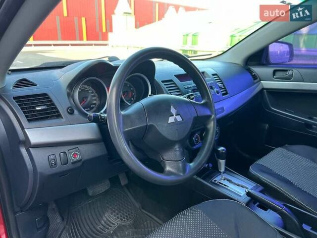 Красный Мицубиси Лансер, объемом двигателя 1.5 л и пробегом 235 тыс. км за 5800 $, фото 14 на Automoto.ua