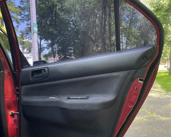 Червоний Міцубісі Lancer, об'ємом двигуна 1.6 л та пробігом 270 тис. км за 5699 $, фото 34 на Automoto.ua