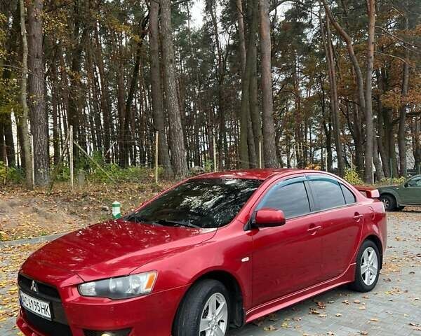 Красный Мицубиси Лансер, объемом двигателя 2 л и пробегом 197 тыс. км за 6500 $, фото 4 на Automoto.ua