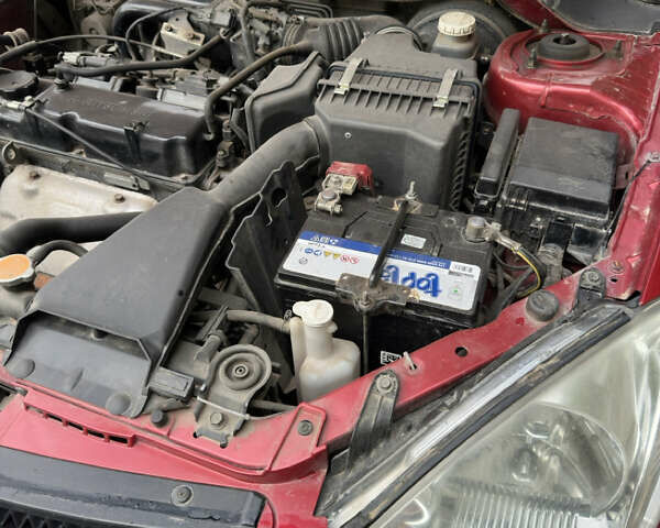 Червоний Міцубісі Lancer, об'ємом двигуна 1.6 л та пробігом 163 тис. км за 5200 $, фото 15 на Automoto.ua
