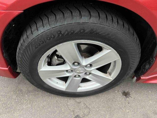 Красный Мицубиси Лансер, объемом двигателя 2 л и пробегом 300 тыс. км за 5700 $, фото 3 на Automoto.ua