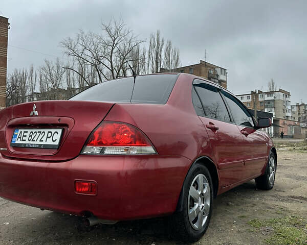 Червоний Міцубісі Lancer, об'ємом двигуна 1.6 л та пробігом 224 тис. км за 4300 $, фото 2 на Automoto.ua