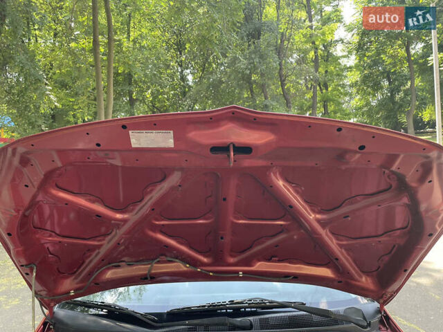 Червоний Міцубісі Lancer, об'ємом двигуна 1.6 л та пробігом 270 тис. км за 5699 $, фото 72 на Automoto.ua