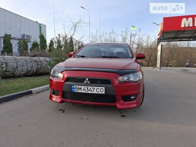 Червоний Міцубісі Lancer, об'ємом двигуна 2 л та пробігом 223 тис. км за 6950 $, фото 5 на Automoto.ua