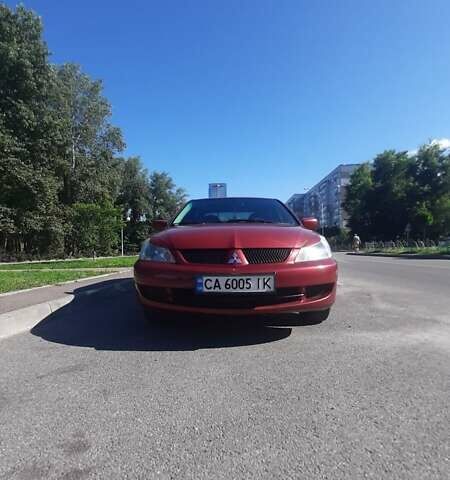 Червоний Міцубісі Lancer, об'ємом двигуна 1.6 л та пробігом 195 тис. км за 5500 $, фото 4 на Automoto.ua