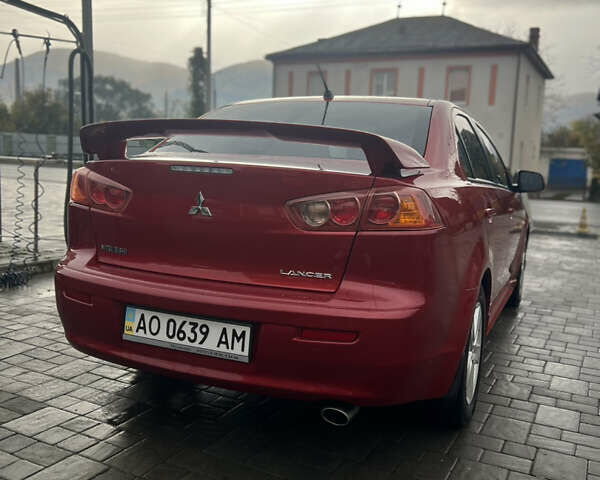 Червоний Міцубісі Lancer, об'ємом двигуна 2 л та пробігом 150 тис. км за 7000 $, фото 5 на Automoto.ua