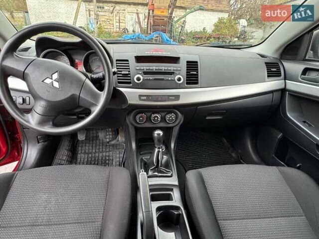 Червоний Міцубісі Lancer, об'ємом двигуна 1.5 л та пробігом 190 тис. км за 6700 $, фото 5 на Automoto.ua