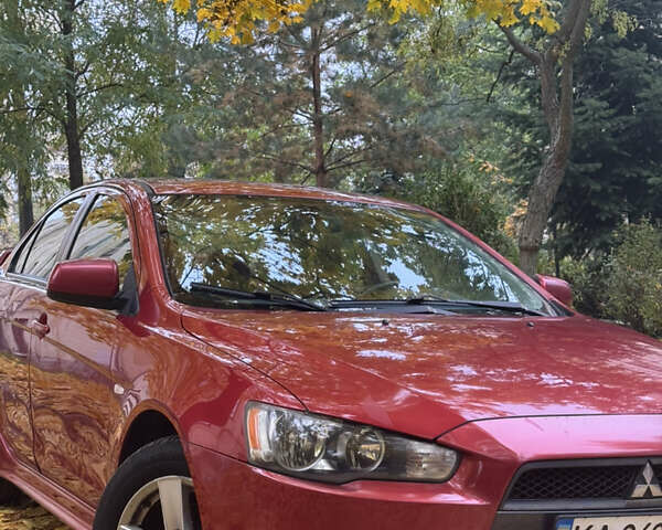 Червоний Міцубісі Lancer, об'ємом двигуна 2 л та пробігом 203 тис. км за 8000 $, фото 7 на Automoto.ua