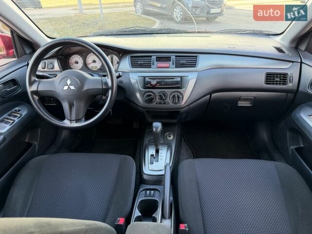 Червоний Міцубісі Lancer, об'ємом двигуна 1.6 л та пробігом 151 тис. км за 4850 $, фото 46 на Automoto.ua