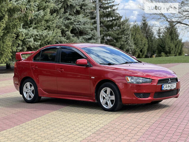 Червоний Міцубісі Lancer, об'ємом двигуна 2 л та пробігом 250 тис. км за 6700 $, фото 5 на Automoto.ua