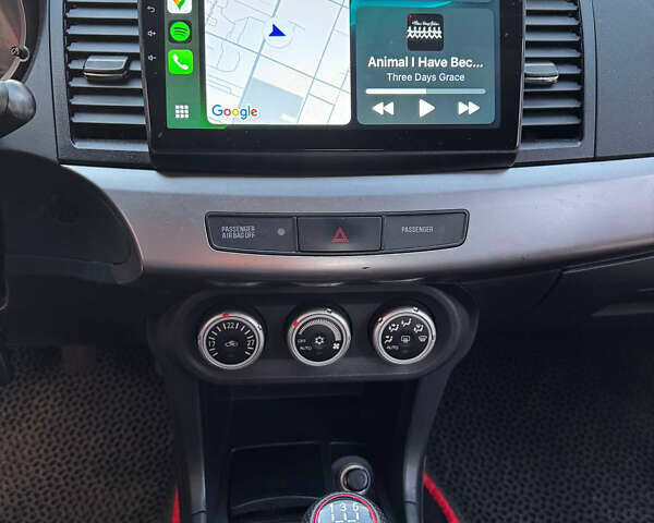 Красный Мицубиси Лансер, объемом двигателя 2 л и пробегом 143 тыс. км за 5200 $, фото 20 на Automoto.ua