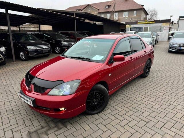 Красный Мицубиси Лансер, объемом двигателя 1.6 л и пробегом 215 тыс. км за 4500 $, фото 4 на Automoto.ua