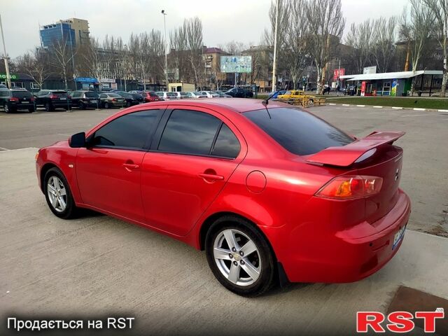 Червоний Міцубісі Lancer, об'ємом двигуна 2 л та пробігом 168 тис. км за 7200 $, фото 5 на Automoto.ua