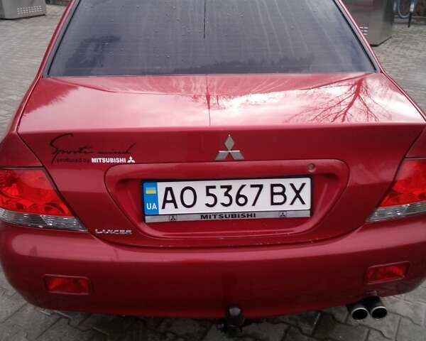 Червоний Міцубісі Lancer, об'ємом двигуна 1.6 л та пробігом 191 тис. км за 4900 $, фото 3 на Automoto.ua