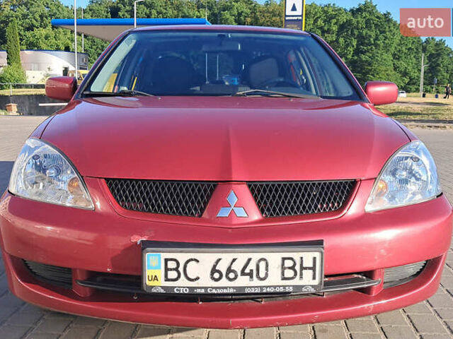 Красный Мицубиси Лансер, объемом двигателя 1.6 л и пробегом 155 тыс. км за 4150 $, фото 4 на Automoto.ua