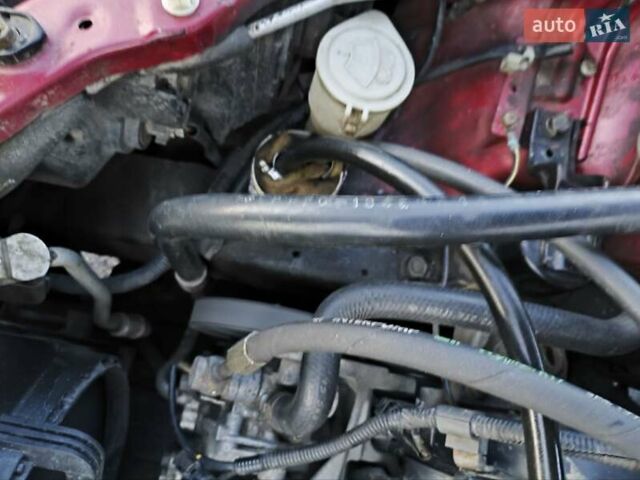 Червоний Міцубісі Lancer, об'ємом двигуна 1.58 л та пробігом 140 тис. км за 6000 $, фото 26 на Automoto.ua