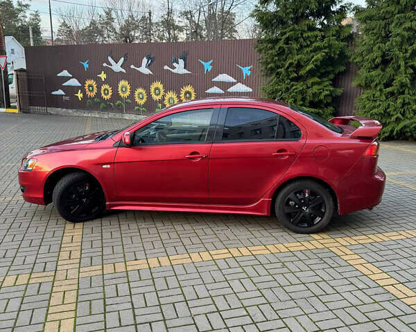 Красный Мицубиси Лансер, объемом двигателя 2 л и пробегом 143 тыс. км за 5200 $, фото 12 на Automoto.ua