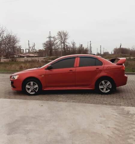 Красный Мицубиси Лансер, объемом двигателя 2 л и пробегом 200 тыс. км за 6000 $, фото 4 на Automoto.ua