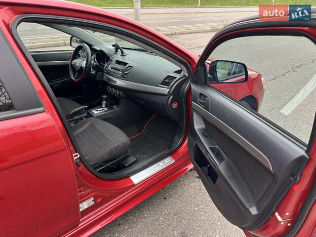 Червоний Міцубісі Lancer, об'ємом двигуна 2 л та пробігом 366 тис. км за 6500 $, фото 10 на Automoto.ua