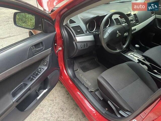 Красный Мицубиси Лансер, объемом двигателя 1.5 л и пробегом 124 тыс. км за 7100 $, фото 5 на Automoto.ua