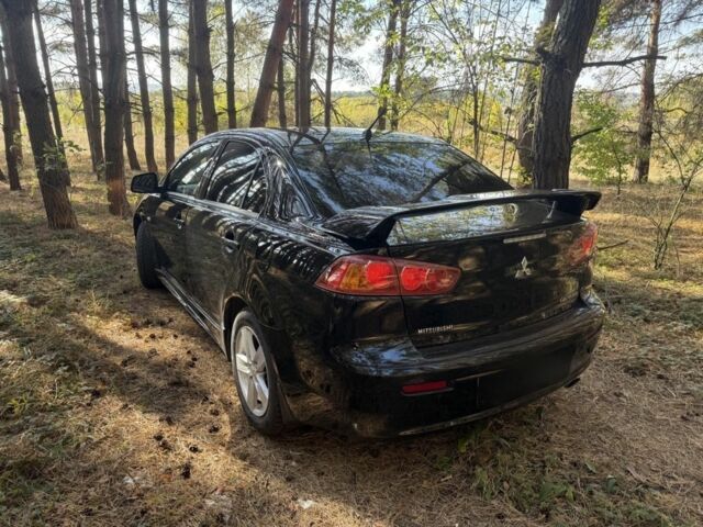 Мицубиси Лансер 2008 в Полтаве на Automoto.ua Красный Мицубиси Лансер, объемом двигателя 2 л и пробегом 170 тыс. км за 7200 $, фото 2 на Automoto.ua