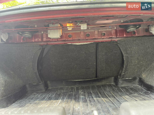 Червоний Міцубісі Lancer, об'ємом двигуна 1.6 л та пробігом 270 тис. км за 5699 $, фото 71 на Automoto.ua