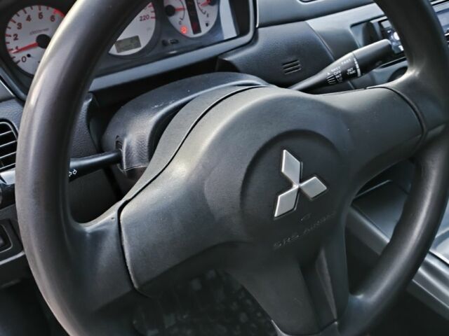 Червоний Міцубісі Lancer, об'ємом двигуна 1.6 л та пробігом 140 тис. км за 6000 $, фото 18 на Automoto.ua