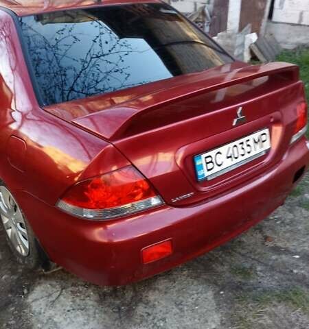 Мицубиси Лансер 2008 в Львове на Automoto.ua Красный Мицубиси Лансер, объемом двигателя 1.58 л и пробегом 280 тыс. км за 3200 $, фото 11 на Automoto.ua