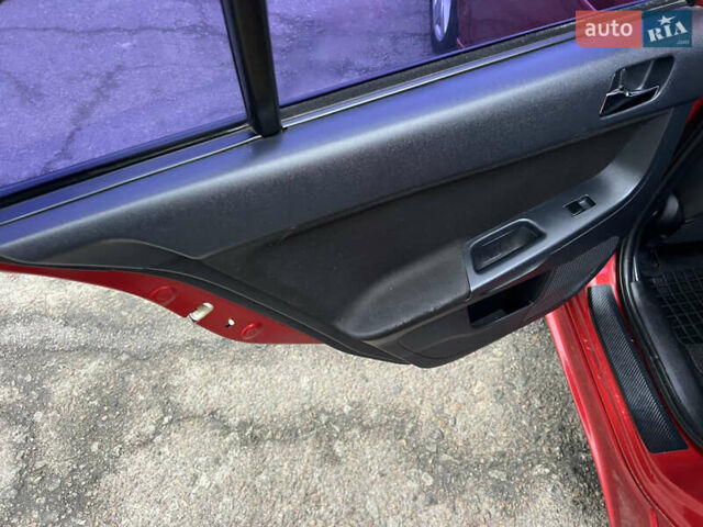 Красный Мицубиси Лансер, объемом двигателя 2 л и пробегом 330 тыс. км за 5250 $, фото 15 на Automoto.ua